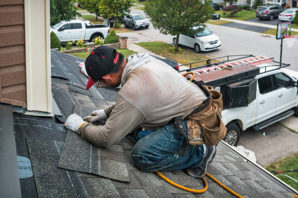 Professional Roofing technician working in Benson, IL
